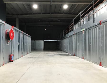 Interior of a climate controlled storage unit with boxes and shelving