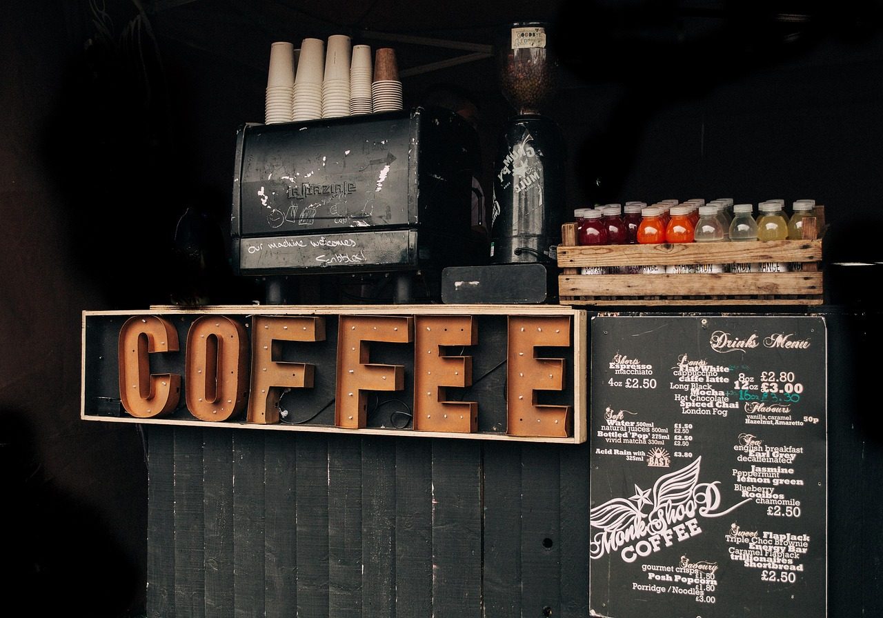 bar, box, business, commerce, container, dark, display, football, indoors, industry, money, people, sign, soccer, stock,