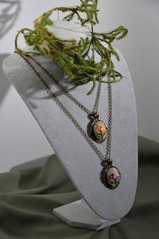 Antique Victorian gold locket with intricate engraving on a velvet background