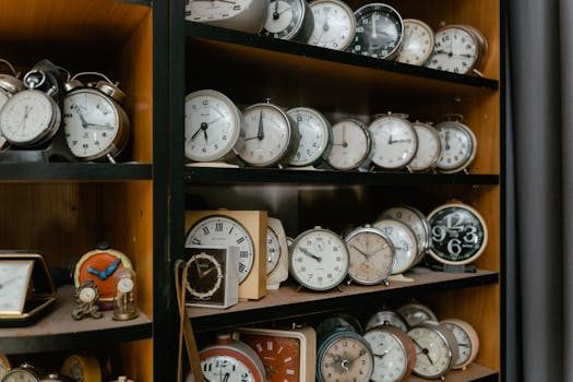 A collection of vintage watches displayed on a wooden shelf, showcasing a collector network on social media
